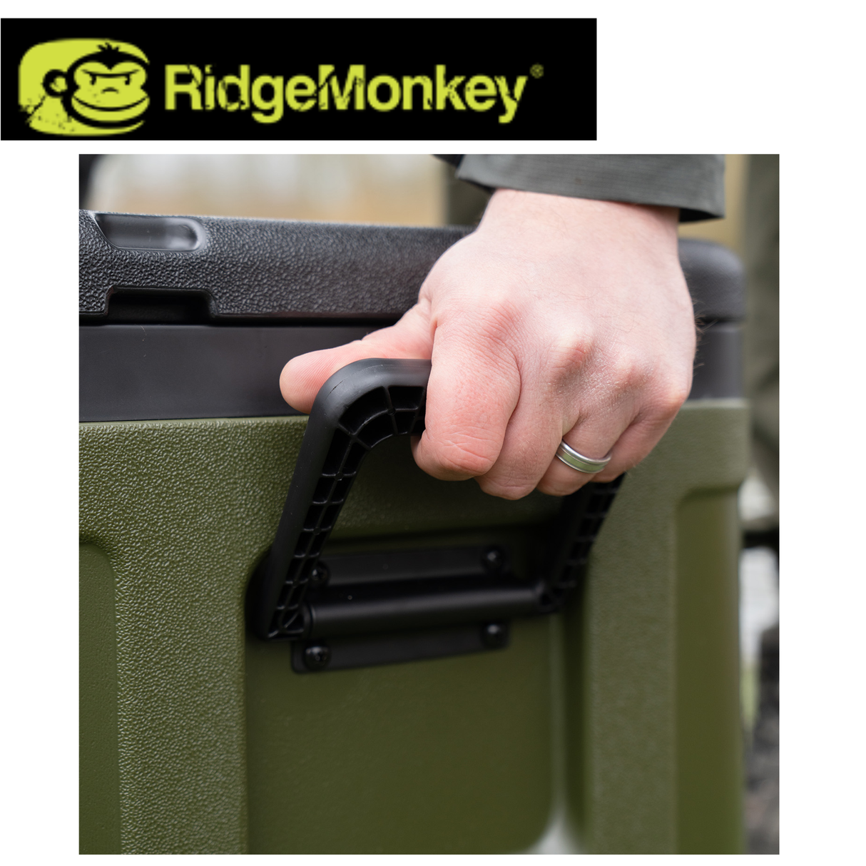 RidgeMonkey Coolabox 30L cooler box with sturdy handle and secure lid for keeping food and drinks cold during outdoor activities.
