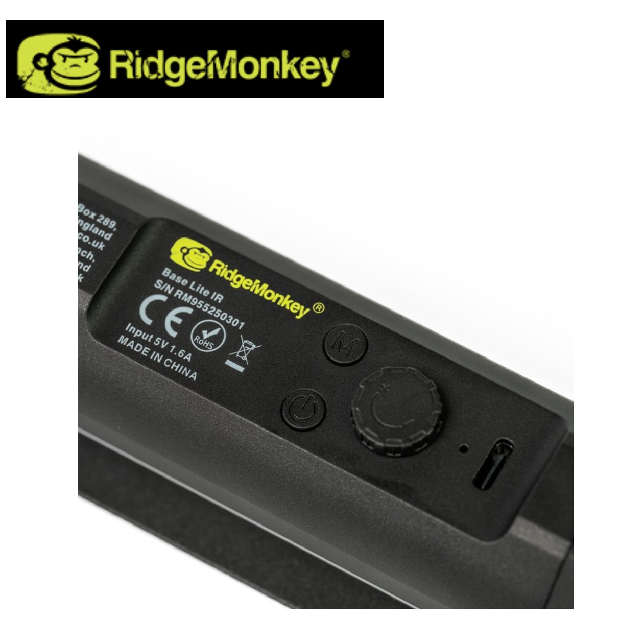 RidgeMonkey Base Lite IR light mounted on a camping setup, compact and lightweight LED camping light for outdoor use.