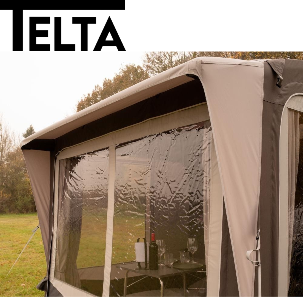 Telta Core 260 Air Awning set up outside, showcasing its spacious design and durable fabric in a camping environment.