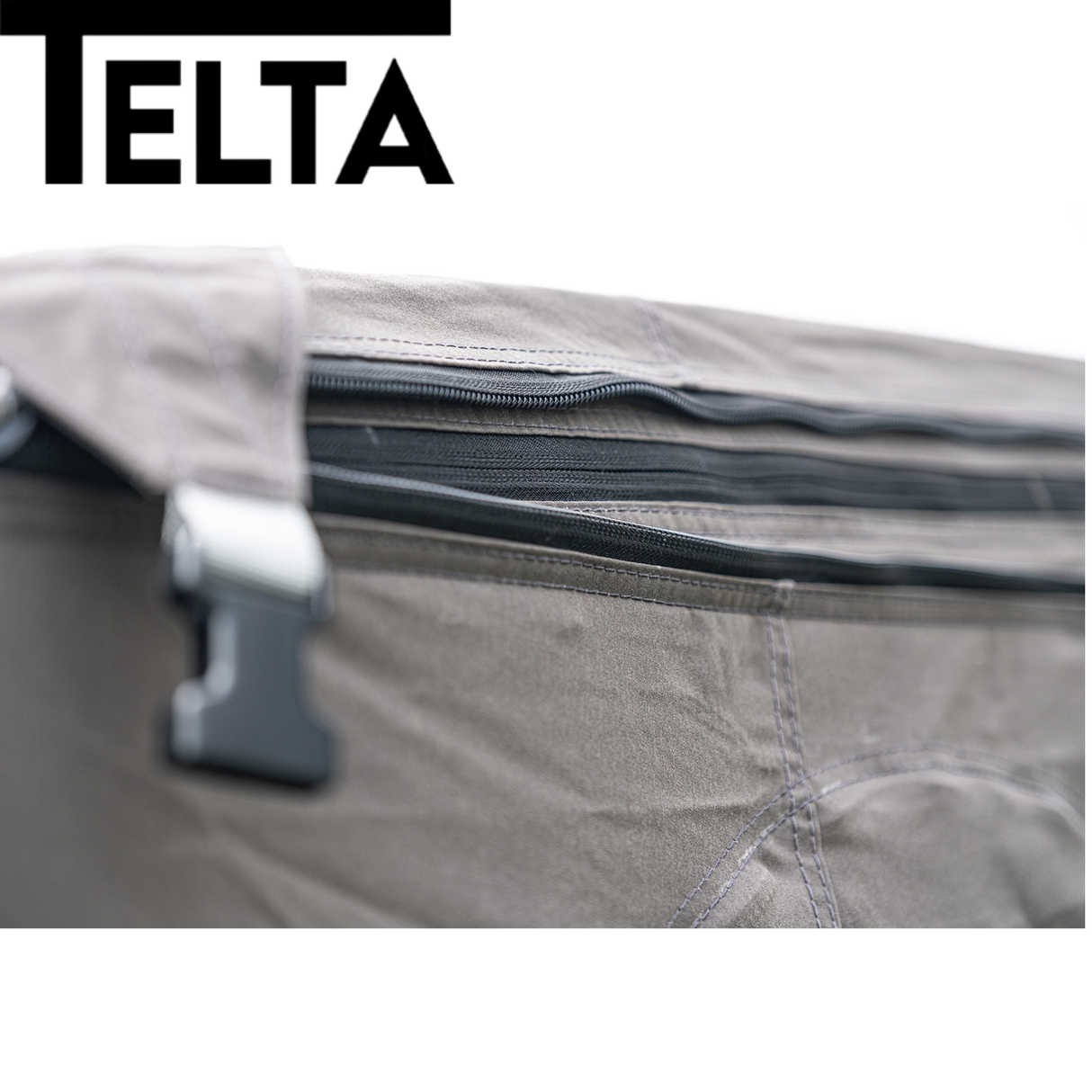 Telta Life 330 Air Awning set up outside, showcasing its spacious design and durable fabric in a natural setting.