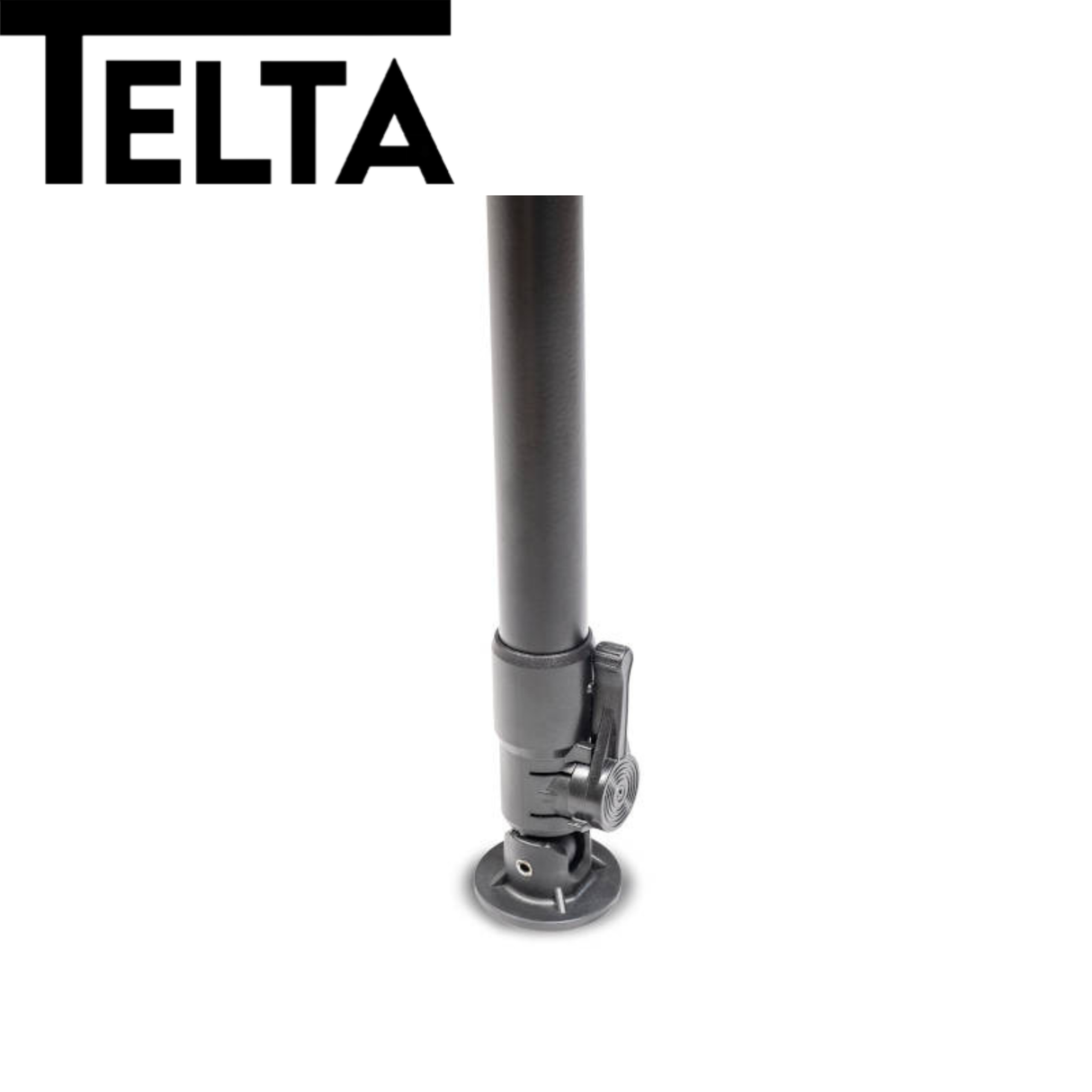 Telta Bornholm medium camping table set up outdoors with a scenic background, showcasing its sturdy design and surface.