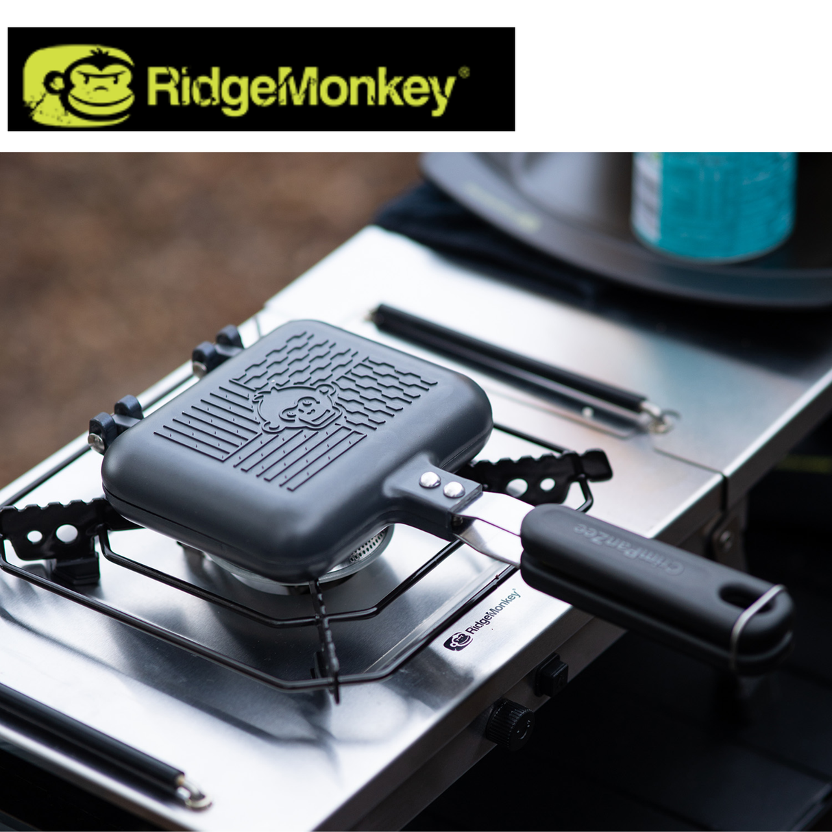RidgeMonkey Crimpanzee Toaster Pan with non-stick surface, designed for easy toasting and cooking in a compact, versatile camping pan.