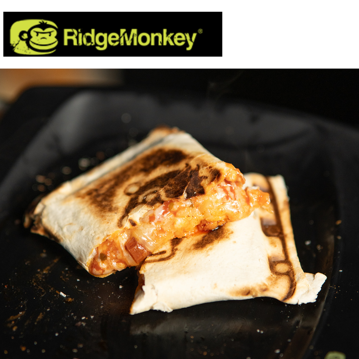RidgeMonkey Crimpanzee Toaster Pan with non-stick surface and foldable handles, ideal for camping and outdoor cooking.