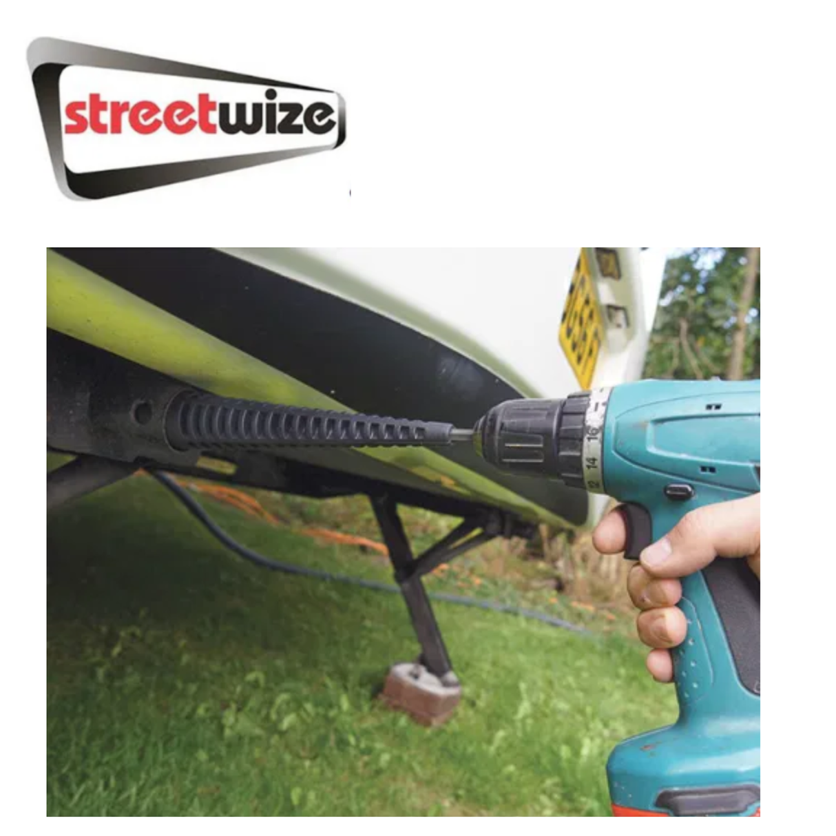 Streetwize Corner Steady Drill Adapter attached to a drill for precise corner work, shown in use on leg2.png.