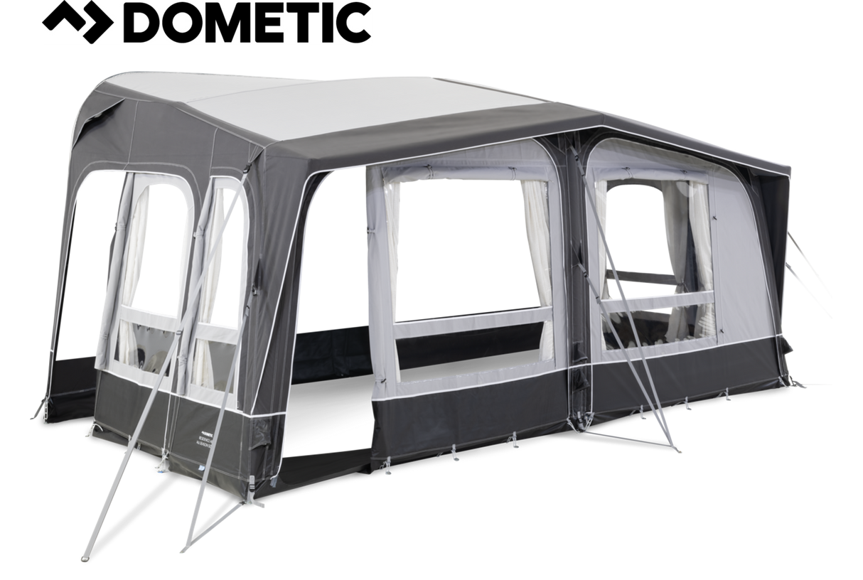 Dometic Residence Air All Season Awning extended, showcasing its sturdy design and fabric in a sunny outdoor setting.