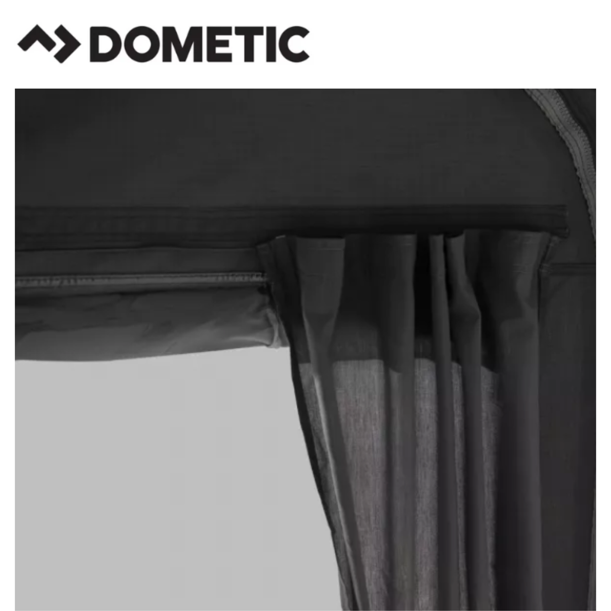 Dometic Residence Air Stay awning attached to a camper, providing shaded outdoor space with fabric and support poles.