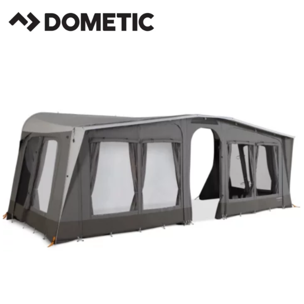 Dometic Stuga Rest Awning attached to a camper, providing shade and shelter, with fabric and support poles visible.