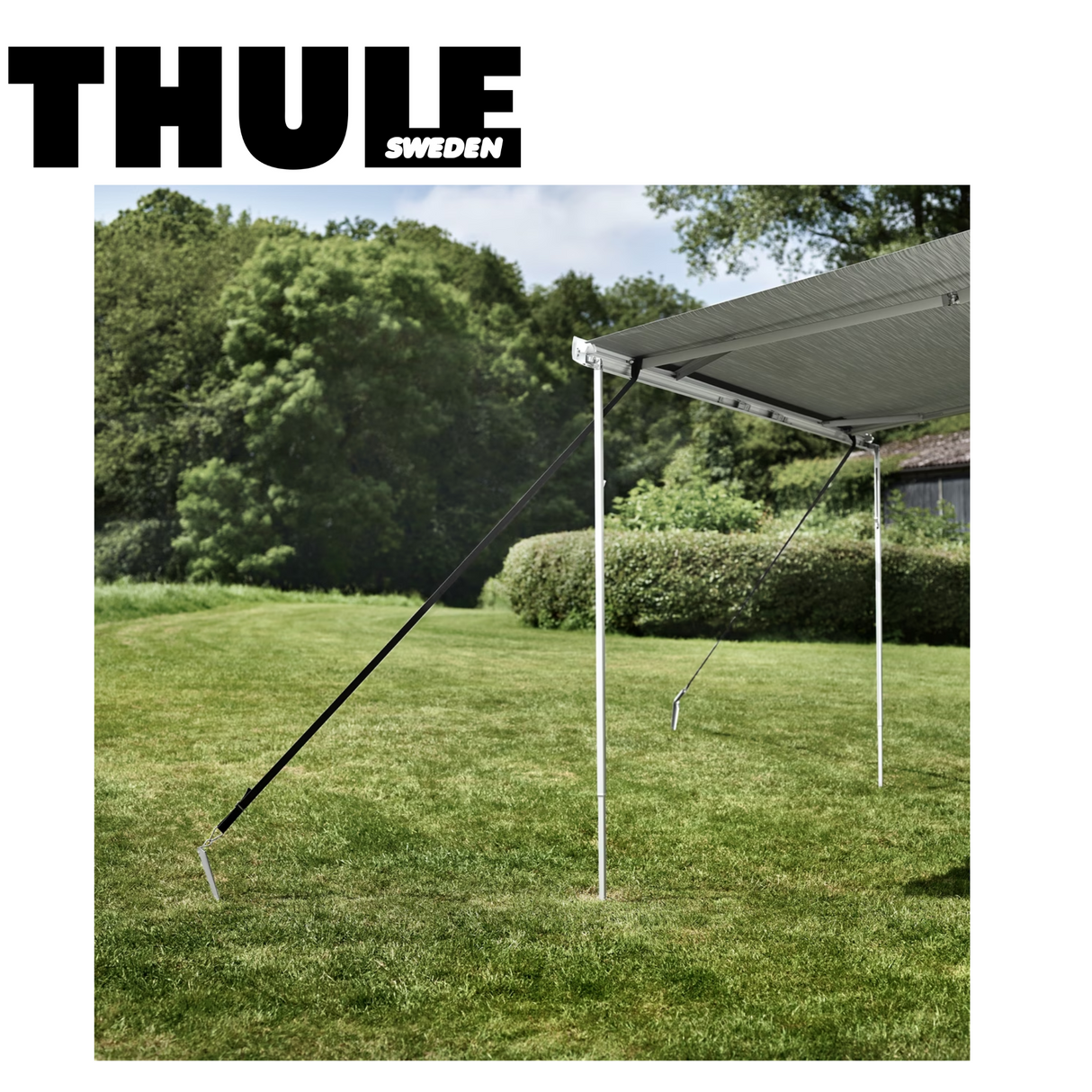 Thule Hold Down Kit 307906 with straps and anchors for secure cargo transport, designed for durability and stability.