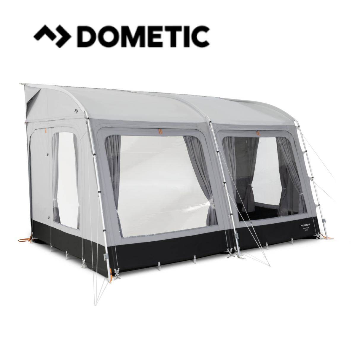 Dometic Rally Tour poled awning set up, showcasing its spacious canopy and sturdy poles in a scenic outdoor setting.