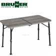 Brunner EluTop Compack 120 table with a sleek, modern design, featuring a smooth surface and sturdy wooden legs.