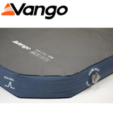 Vango Rock and Roll 12cm Camper Sleeping Mat in green, showcasing its cushioned surface and compact rolled-up design.