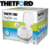 Thetford 145 Porta Potty Qube Portable Toilet with a sleek design, compact size, and sturdy construction for outdoor use.