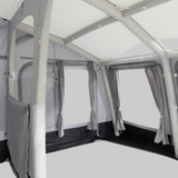 Dometic Rally Air Tour driveaway awning installed on a camper, showcasing its spacious design and durable fabric.