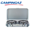 Campingaz Camping Kitchen 2 Grill & Go, 4000W, featuring a portable grill with cooking surface and adjustable controls.