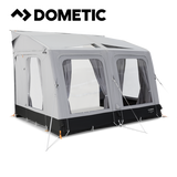Dometic Rally Air Tour 330 air awning set up outside a camper, showcasing its spacious design and durable construction.