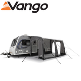 Vango Balletto Air 390 Caravan Awning set up beside a caravan, showcasing its spacious design and airy structure.
