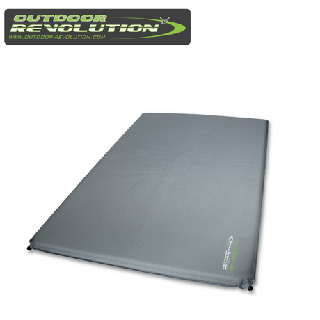 Outdoor Revolution Camp Star Top of the Pop 50mm self-inflating sleeping mat on a campsite, showcasing its thickness and texture.