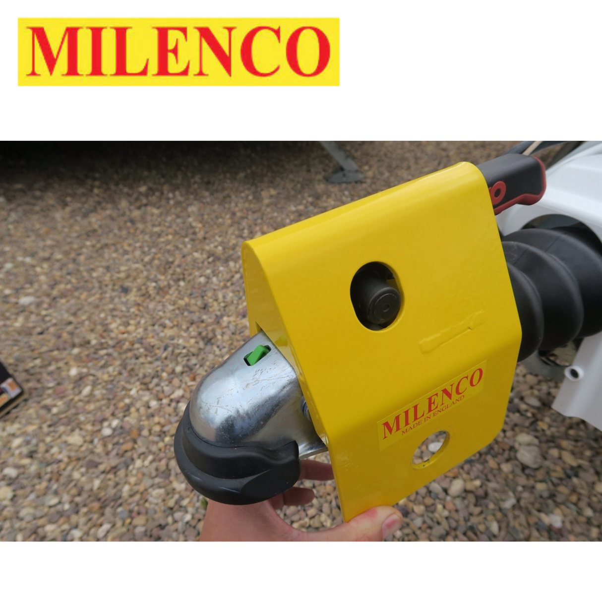 Milenco Super Heavy Duty AKS 161 Hitchlock securely mounted, showcasing its robust design and locking mechanism.