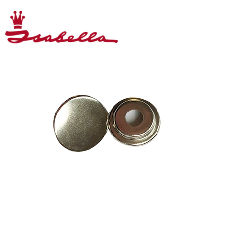 Close-up of Isabella fabric press stud 60022, a durable metal snap fastener for clothing and fabric projects.