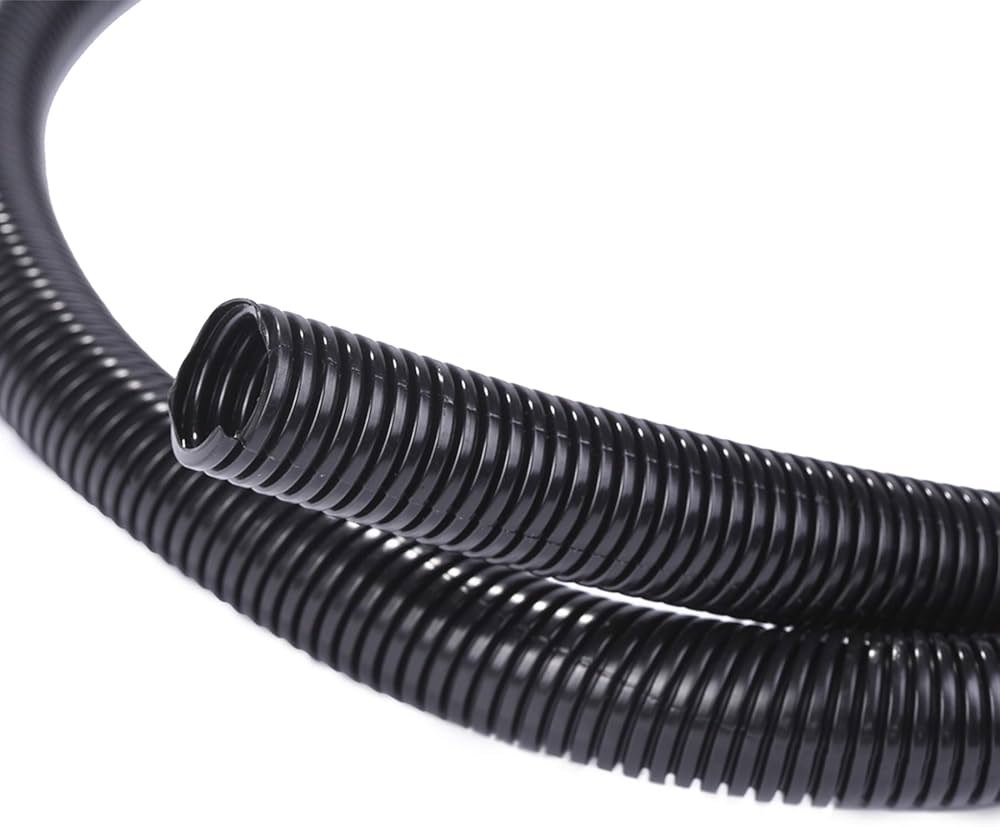 Black 3/4-inch convoluted waste pipe by Waste Pipe, showing flexible, textured plastic pipe for plumbing drainage.