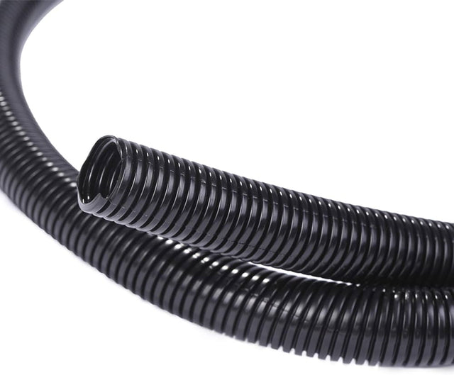 Black 3/4-inch convoluted waste pipe by Waste Pipe, showing flexible, textured plastic pipe for plumbing drainage.