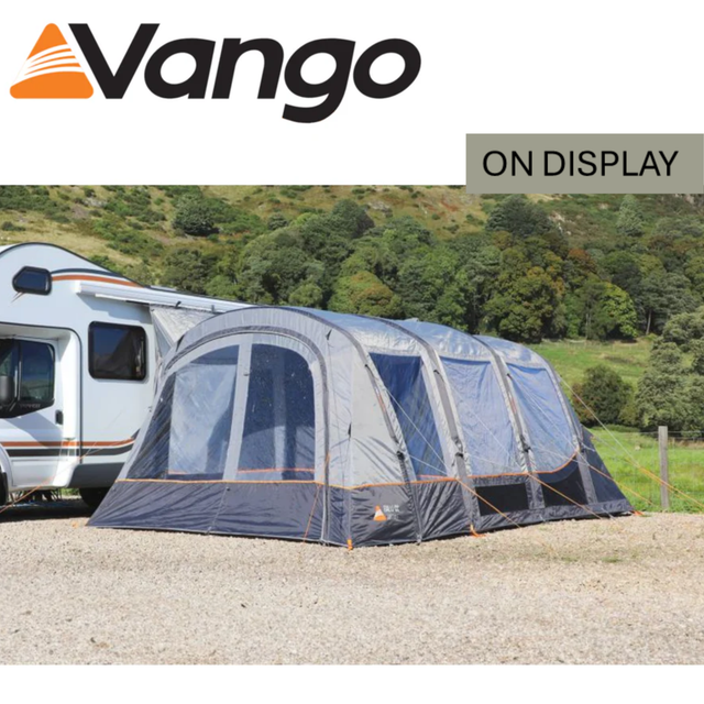 Vango Galli CC Air Tall Driveaway Awning with spacious interior and air beams, set up next to a camper van.
