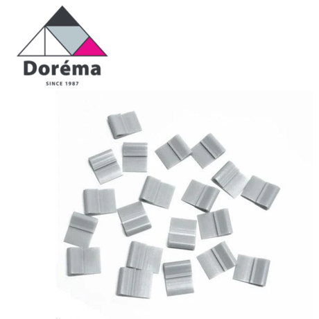 Dorema curtain profile fixings clips for securing curtain profiles, shown in a close-up image of the clips.