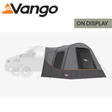Vango Faros Air III Low Driveaway Awning set up outside a camper van, showing its spacious fabric structure and integrated side panels.