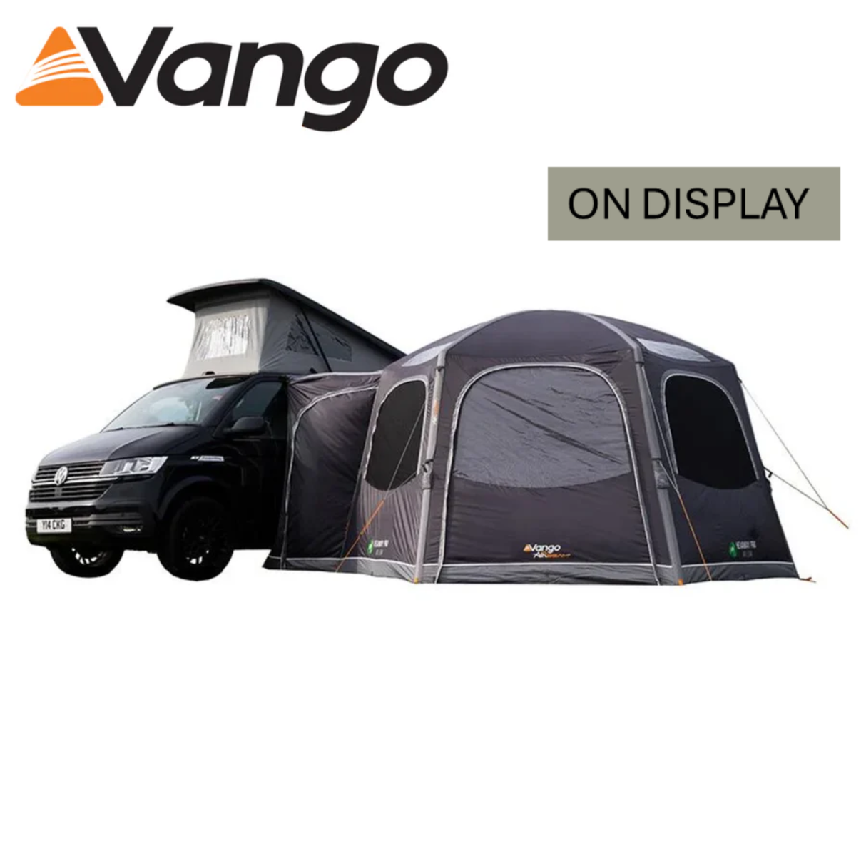 Vango Hexaway Pro Air Low Driveaway Awning set up beside a camper van, showcasing its spacious design and air beams.