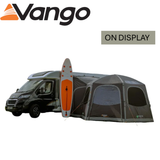 Vango Hexaway Pro Air Tall Driveaway Awning set up beside a camper van, showcasing its spacious design and durable fabric.