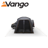 Vango Tailgate Hub II Low Poled set up in a backyard, showcasing its spacious design and durable fabric.
