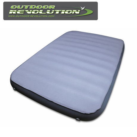 Outdoor Revolution Skyfall Double 200 self-inflating sleeping mat in a rolled state on a grassy surface.