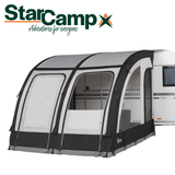 Dorema StarCamp Magnum AirForce Klimatex 260 air porch awning displayed in a campsite setting with a clear sky.