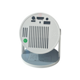 P.L.S Pro+ projector displaying a bright, clear image on a wall with a sleek black design and adjustable focus.