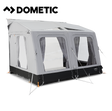 Dometic Rally Air Tour 390 air awning attached to a camper, showcasing its fabric canopy and air frame for outdoor camping.