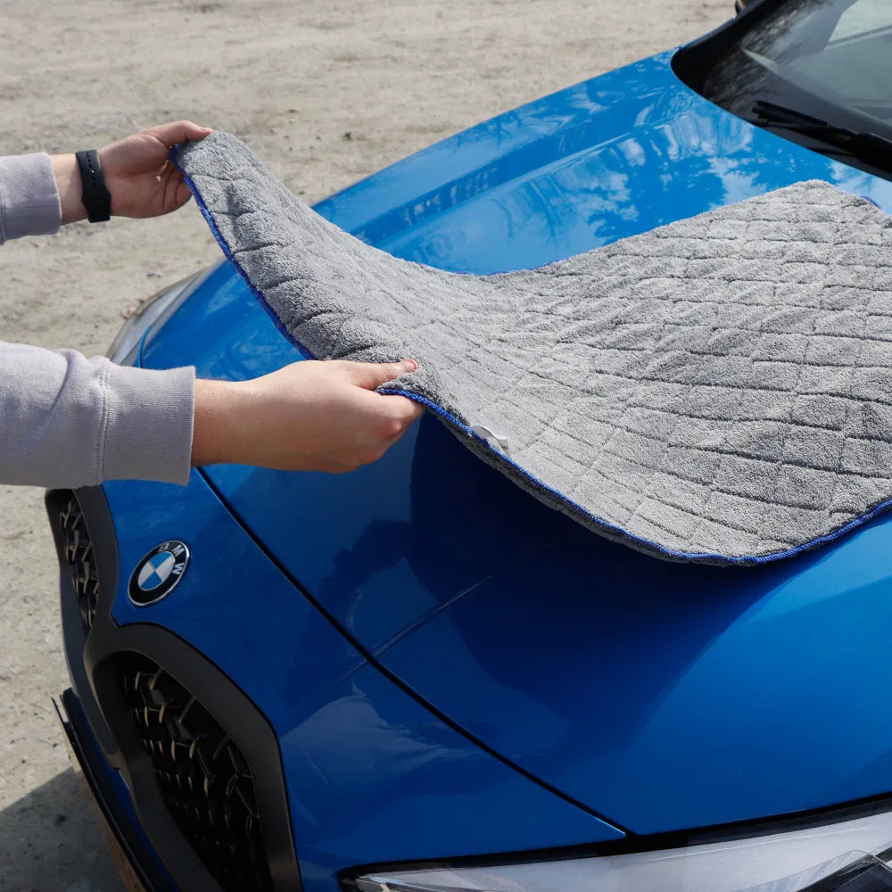 Streetwize Supreme Drying Towel in use, showcasing its absorbent cloth material for efficient drying.