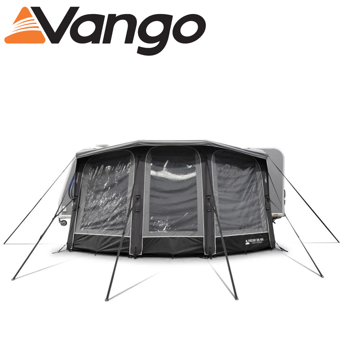 Vango Tuscany Air Pro Shield 400 caravan awning set up beside a caravan, showcasing its spacious design and sturdy structure.