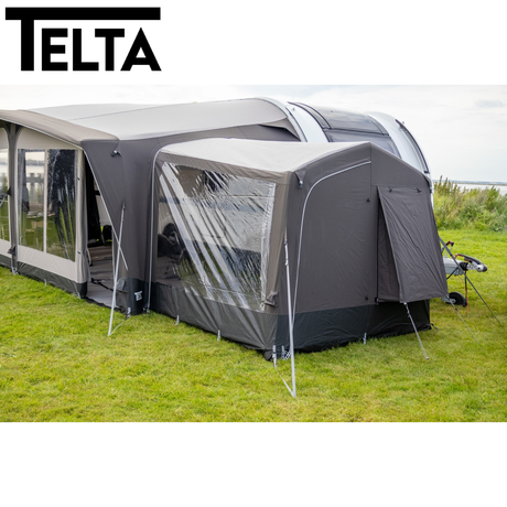Telta Touring Extra Tall Annexe air awning, showcasing spacious design and vibrant fabric in outdoor setting.