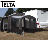 Telta Touring Extra Tall Annexe air awning set up beside a camper, showing spacious interior and tall design features.