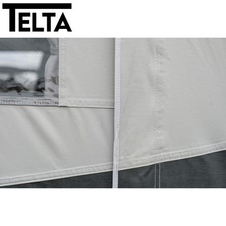 Telta Pace 390 lightweight poled awning set up in a campsite, showcasing its spacious design and sturdy poles.