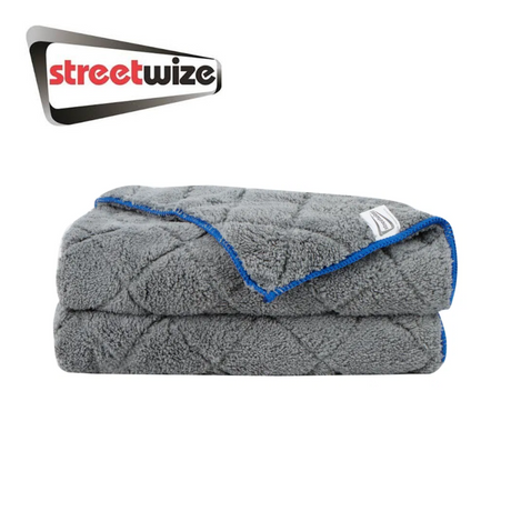Streetwize Supreme Drying Towel displayed on a surface, showcasing its soft texture and large size for effective drying.