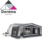 Dorema Monza 240 DeLuxe Full Awning set up on a camper, showcasing its spacious design and durable fabric.