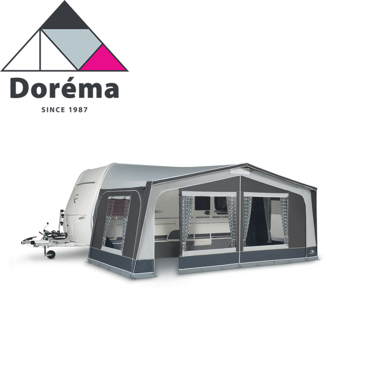 Dorema Monza XL 300 Full Caravan Awning set up outside a caravan, showcasing its spacious design and durable fabric.