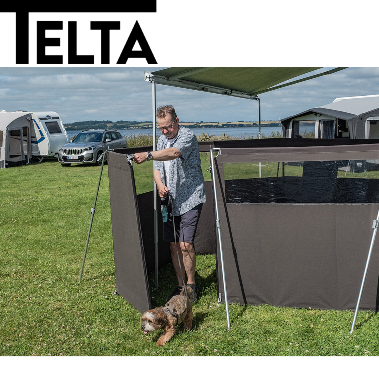 Telta aluminium windbreak swing door panel with a sleek design, ideal for outdoor spaces and patio areas.