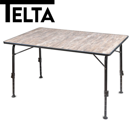 Telta Bornholm large camping table set up outdoors, showcasing its sturdy design and spacious surface for outdoor activities.