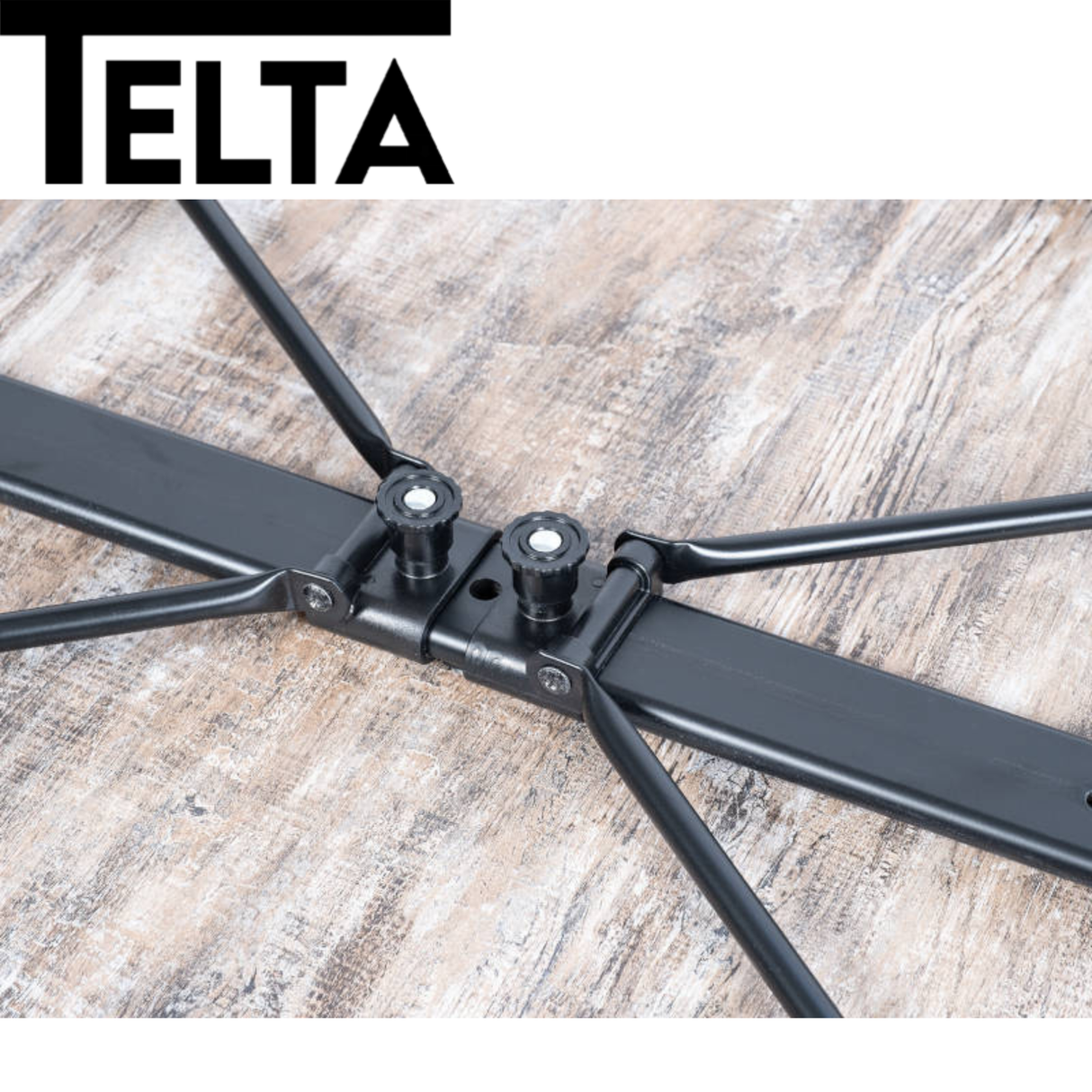 Telta Bornholm large camping table set up outdoors, featuring a sturdy design and ample surface for dining and activities.