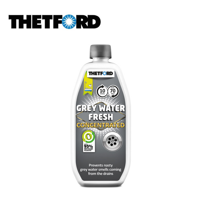 Thetford Grey Water Fresh tank cleaner bottle with label, featuring a sleek design and vibrant colors on a white background.
