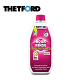 Thetford Aqua Rinse Concentrated toilet fluid in a bottle, featuring a bright blue label and clear liquid inside.