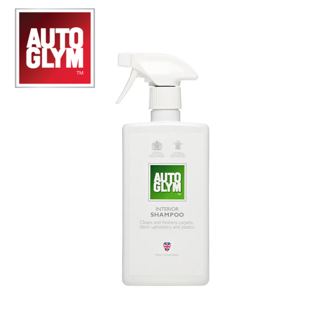 Autoglym Interior Shampoo bottle on a clean surface, showcasing its label and ergonomic design for vehicle cleaning.