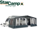 StarCamp Valor Air All Season Full Air Awning set up outside a caravan, showcasing its spacious design and robust structure.